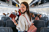 Young Woman Boarding An Airplane