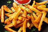 Homemade French fries with ketchup