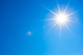 Blue sky with bright sun