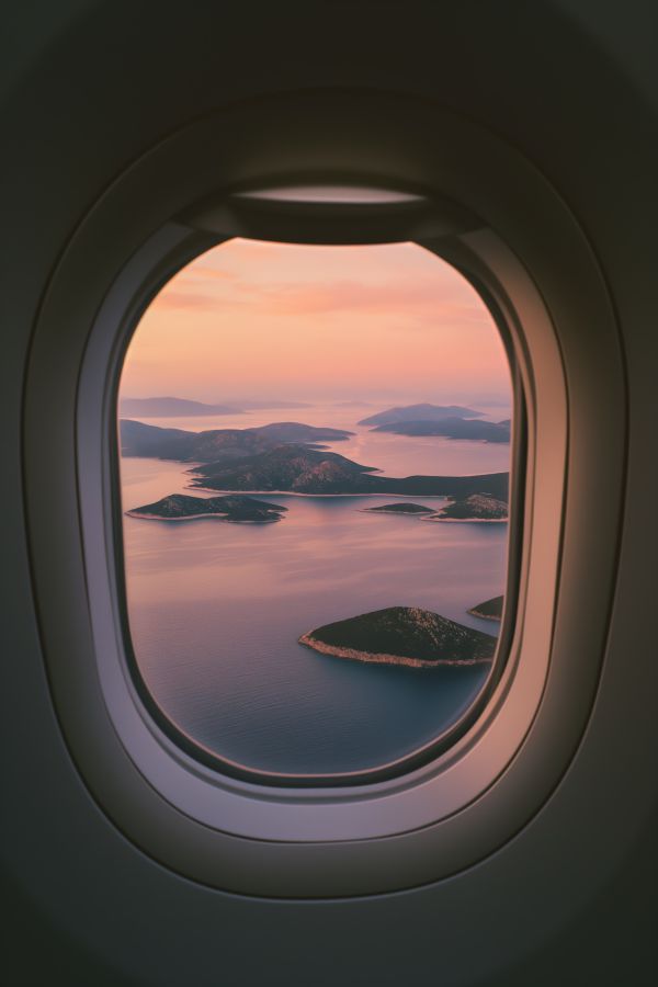 View from Airplane Window of Beautiful Small Islands Free Image